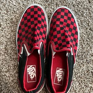 Red and black checkered Vans